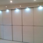 Aluminimum sliding door wardrobe with lights by Creative Joinery Bedrooms