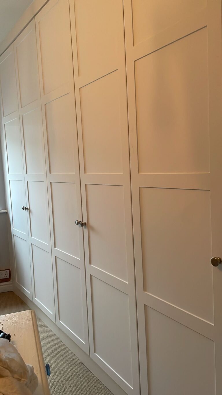 5 door white wardrobe with panels and gold handles