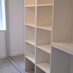wardrobe interior with shelves and hanging rails - White