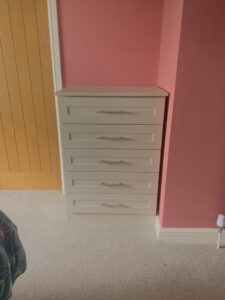free standing made to measure tall boy drawers unit in the Shaker style.