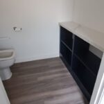 bespoke fitted bathroom cabinets, blue colour finish with a white marble worktop