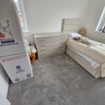 White chest of 4 drawers with silver handles