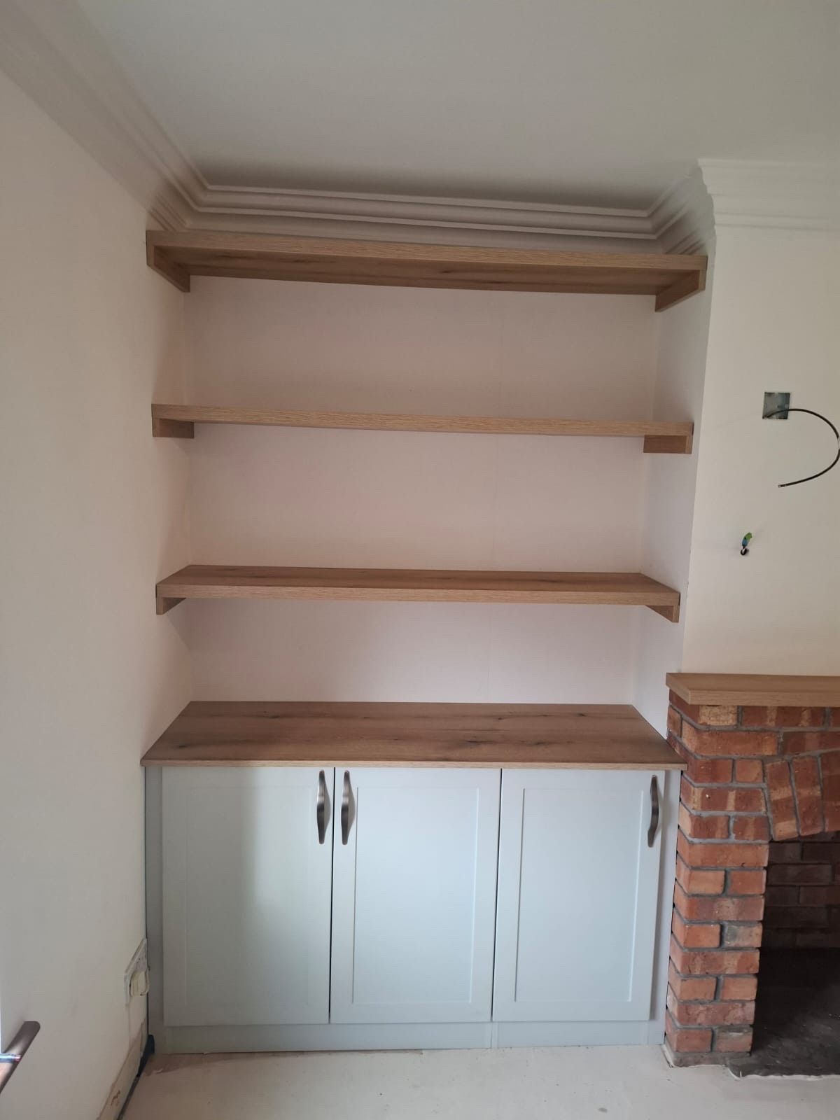 3 drawer cabinet with white doors, oak top and silver handles. Matching oak shelves