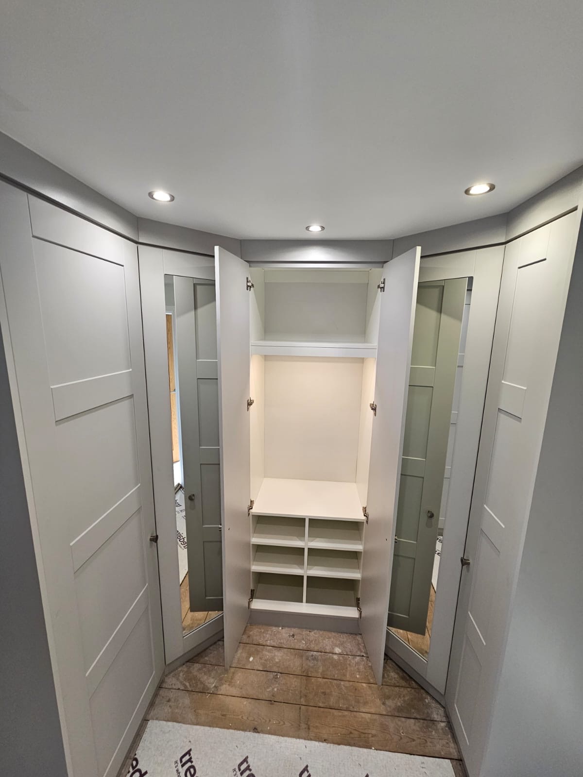 Made-to-measure U-Shape fitted wardrobes in Taupe Grey colour finish by Creative Joinery