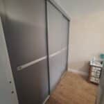 Grey sliding doors with Aluminium sliding door frame - custom made and fitted by Creative Joinery