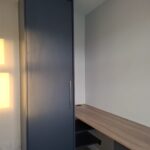 Fitted single wardrobe and desk with shelves underneath