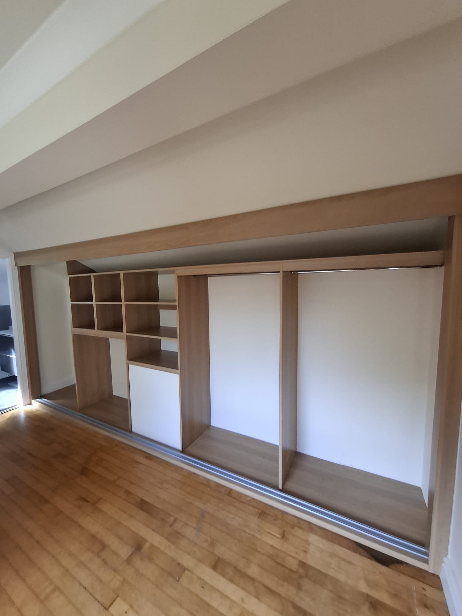 Wood wardrobe with rails, shelves and small cabinet