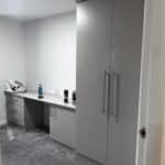Fitted double wardrobe and desk with one set of three drawers and one cupboard
