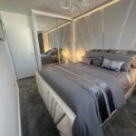 made to measure mirrored sliding door wardrobe by Creative Joinery