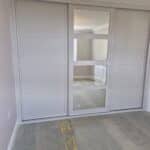3 Door Sliding Wardrobe With Mirror in White