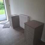 Shaker bedside tables with three drawers in the colour Stone Grey