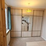 Light Wood 3 Door Wardrobe With Centre Mirror