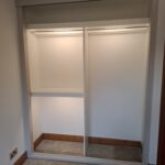 Wardrobe hanging rail fitted beneath a top shelf for everyday clothing storage