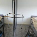 Accessible wardrobe pull-down hanging rail lowered to reachable height.