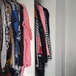 Interior of wardrobe with two rails, shelves and drawers - White