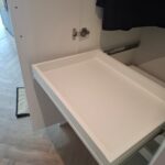 Wardrobe pull-out tray for accessories, folded items or storage baskets.