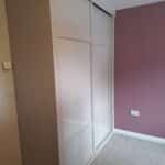 Fitted wardrobe with two sliding doors in neutral colour, Cashmere. Fitted wardrobes in Coppull, Chorley.