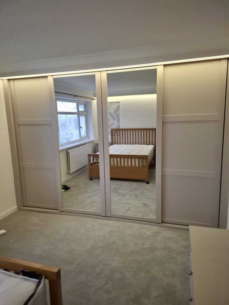 Custom shaker sliding door wardrobe fitted in Blackrod, Bolton. By Creative Joinery Chorley