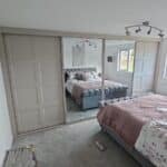 Bespoke Shaker sliding wardrobes fitted in Ashton-In-Makerfield, Wigan by Creative Joinery Bedrooms - White