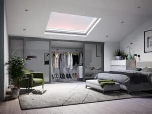 4 door sliding wardrobe with grey doors. open to show hanging rail and shoe rack
