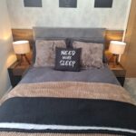 Matching wooden bedside tables