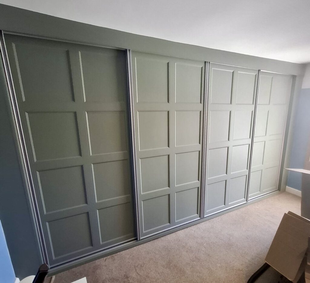 Made to measure Shaker sliding door wardrobes - 4 doors in Reed Green colour