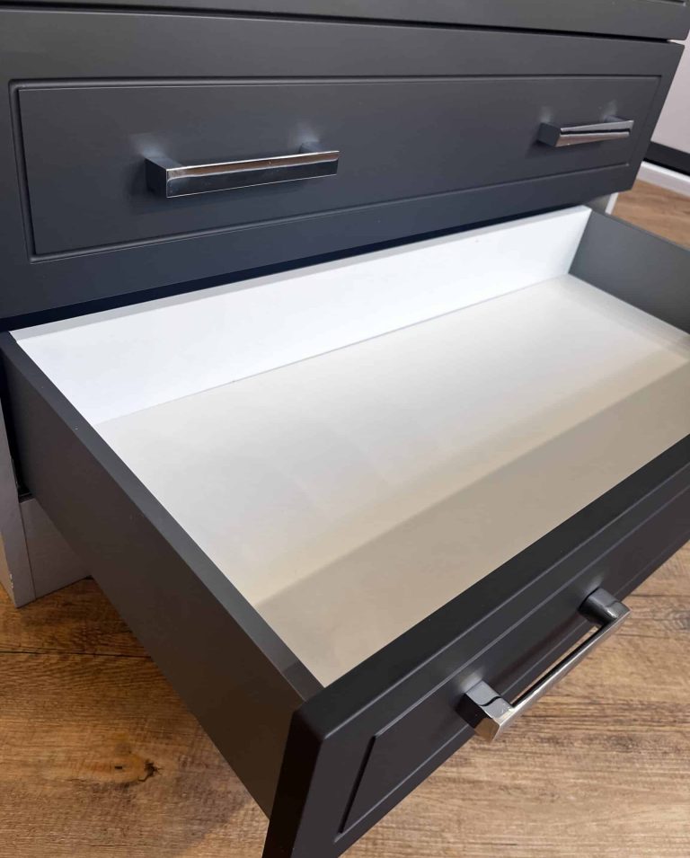 Soft-close wardrobe drawer boxes with premium smooth-glide runners.