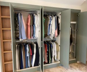 Open wardrobe interior with a bar rail fitted without a top shelf for maximum hanging height.